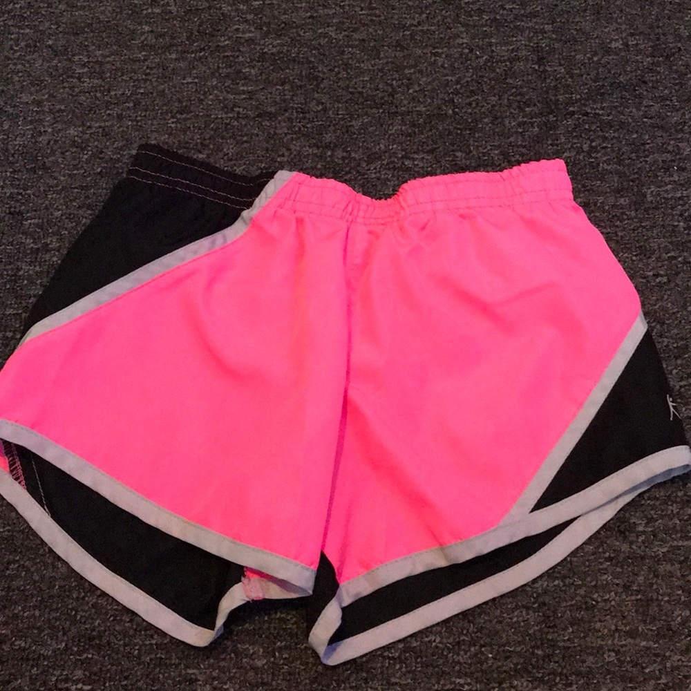 Black and pink athletic shorts